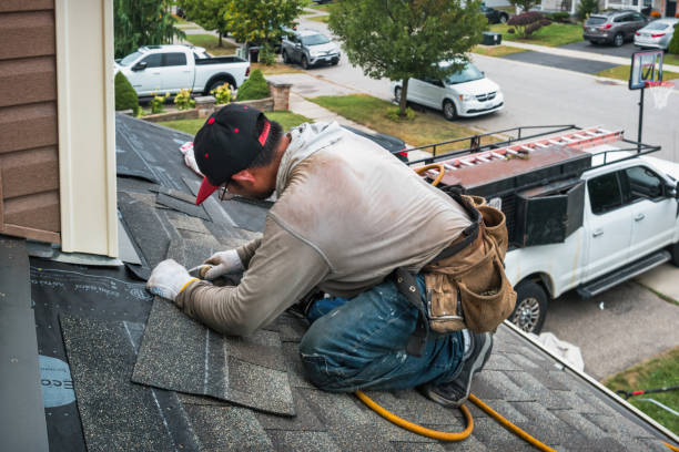 Professional Roofing technician working in Bedford, NH